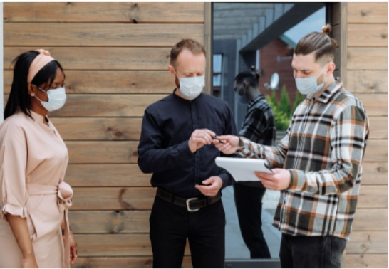 The buyer, seller, and wholesaler hashing out a contract.
