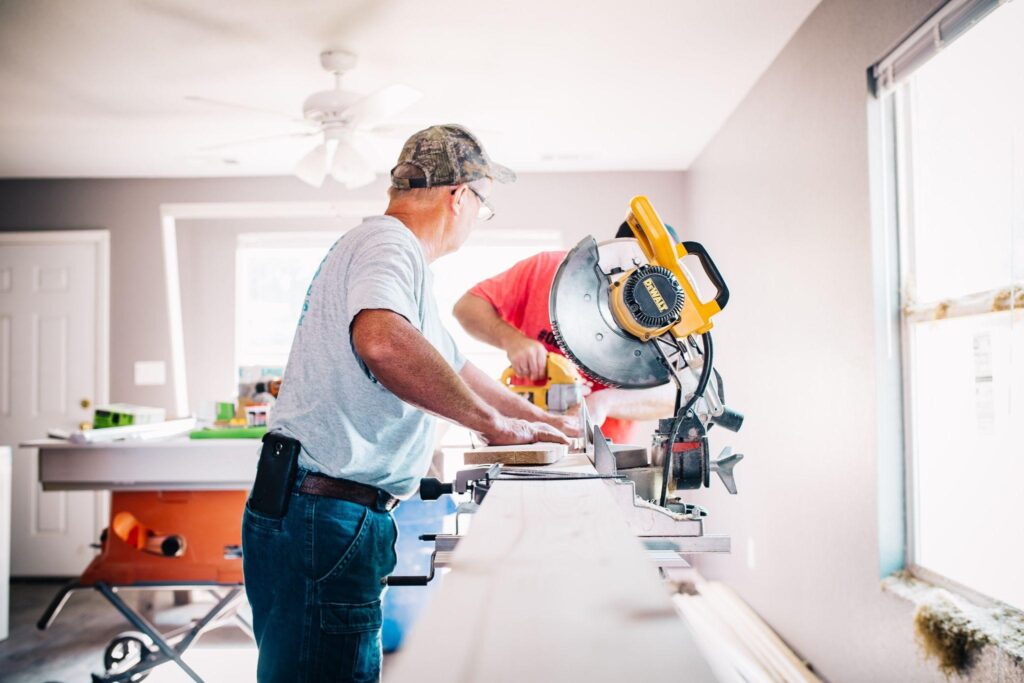 A pair of carpenters need to work on house renovations