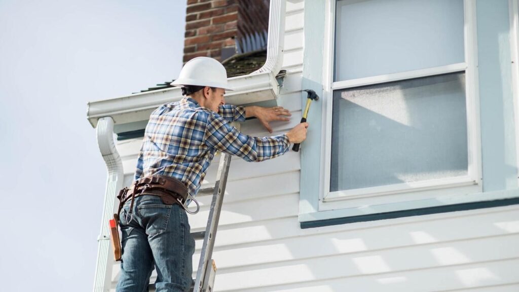 Man repairing a house