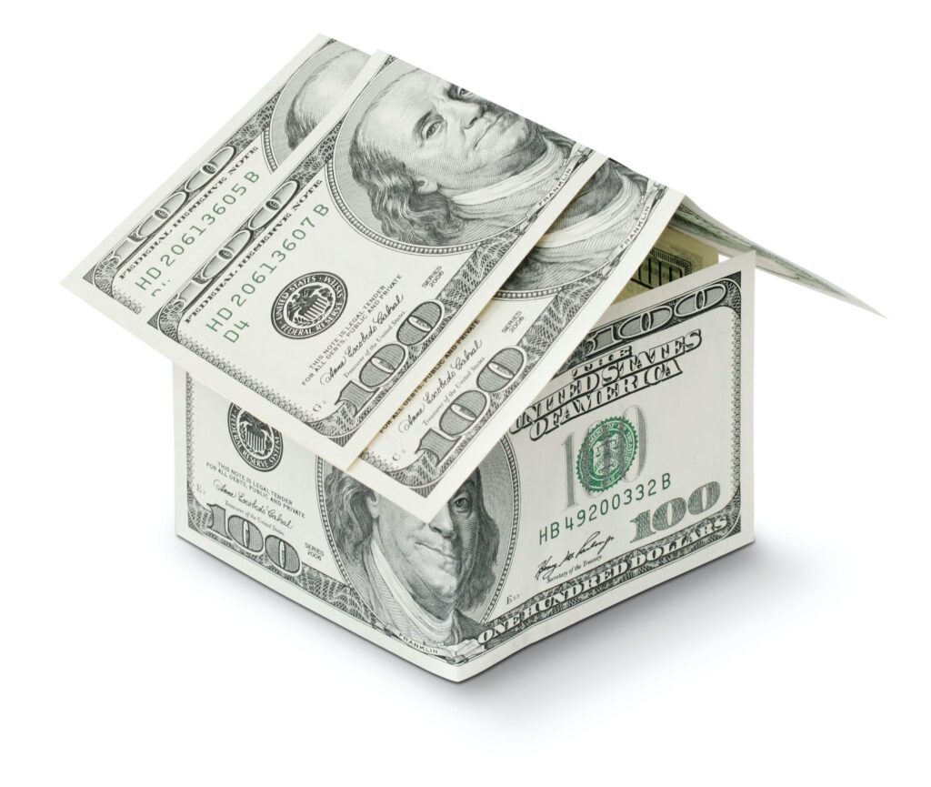 A small home made out of dollar bills